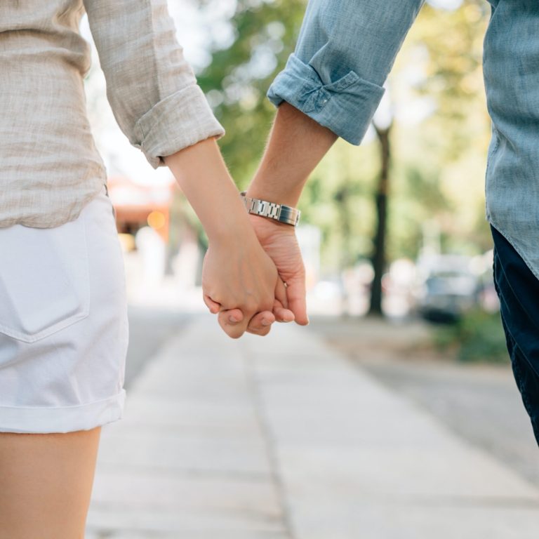 couple holding hands