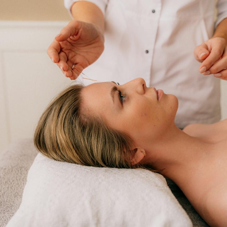 woman lying down for massage
